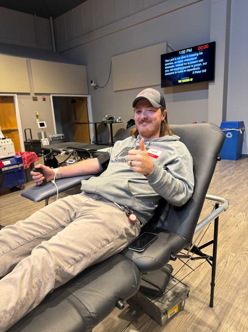 Dan of Rood Revivers makes a blood donation at the 2025 blood drive.